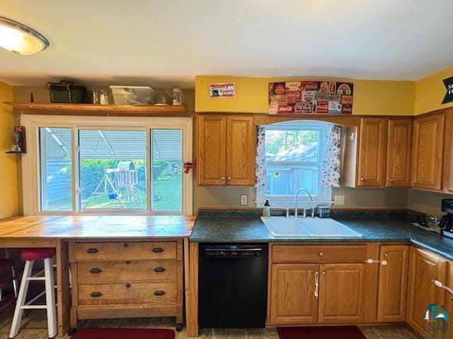 1339 92nd Ave W, Duluth, MN 55808 - kitchen featuring dishwasher, brown cabinetry, and dark countertops