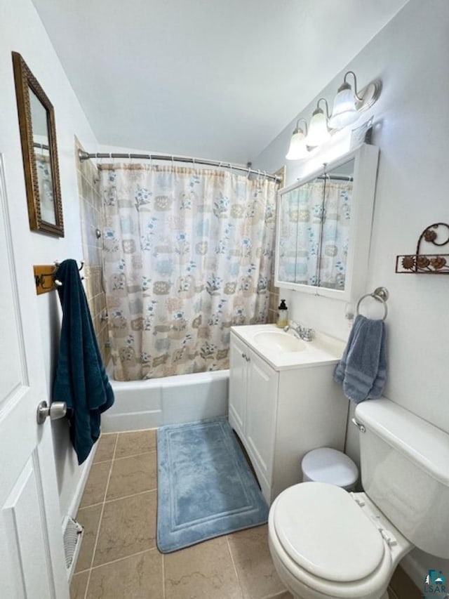 1339 92nd Ave W, Duluth, MN 55808 - bathroom featuring shower / bath combo with shower curtain, vanity, and tile patterned floors