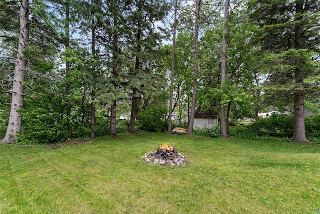2420 Piedmont Ave, Duluth, MN 55811 - view of green lawn featuring an outdoor fire pit