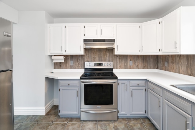41 Cato Ave, Duluth, MN 55808 - kitchen featuring appliances with stainless steel finishes, range hood, light countertops, and gray cabinetry
