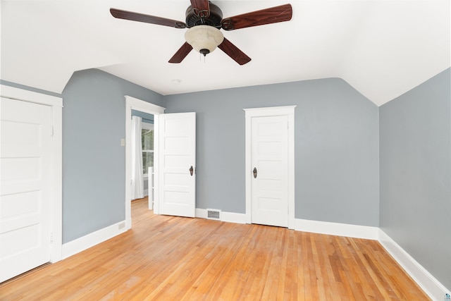 41 Cato Ave, Duluth, MN 55808 - unfurnished bedroom featuring light wood finished floors, ceiling fan, and vaulted ceiling