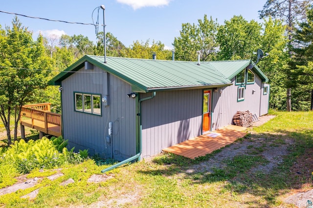 1475 Echo Trl, Ely, MN 55731 - view of property exterior featuring a wooden deck and a metal roof