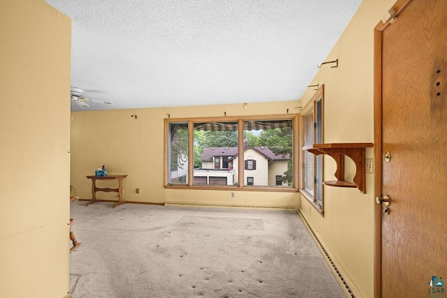 5525 Highland St, Duluth, MN 55807 - carpeted spare room with a textured ceiling and ceiling fan
