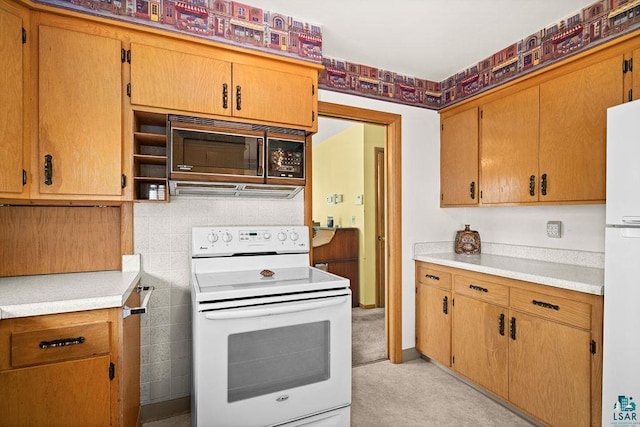 5525 Highland St, Duluth, MN 55807 - kitchen featuring white appliances and light countertops