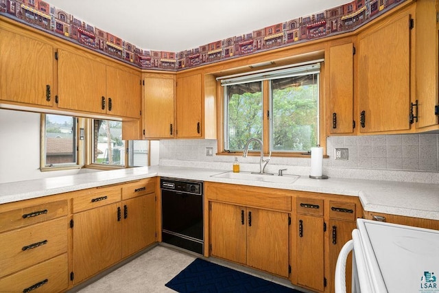 5525 Highland St, Duluth, MN 55807 - kitchen with black dishwasher, stove, light countertops, and tasteful backsplash