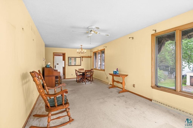 5525 Highland St, Duluth, MN 55807 - living area with baseboard heating, a chandelier, carpet floors, and ceiling fan