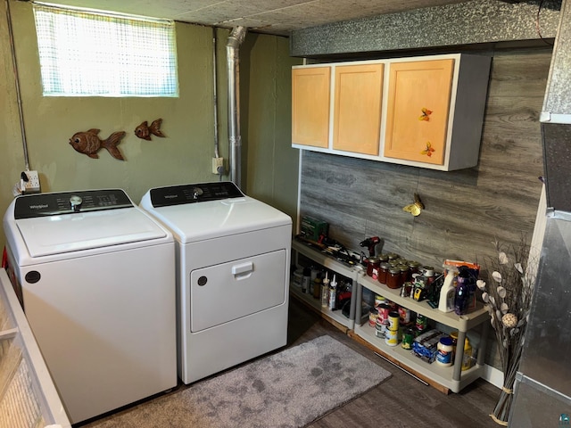 1264 92nd Ave W, Duluth, MN 55808 - washroom with washer and dryer, cabinet space, and wood finished floors