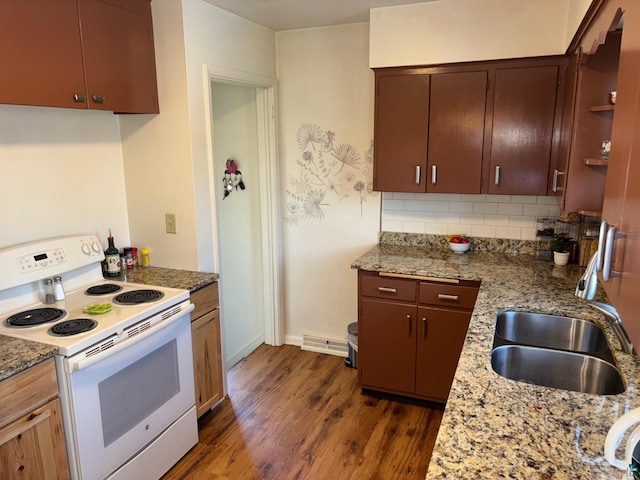1264 92nd Ave W, Duluth, MN 55808 - kitchen featuring white electric range, dark wood-style flooring, decorative backsplash, and light stone countertops