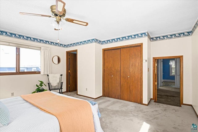 2807 E 2nd St, Duluth, MN 55812 - bedroom with a closet, light carpet, and ceiling fan