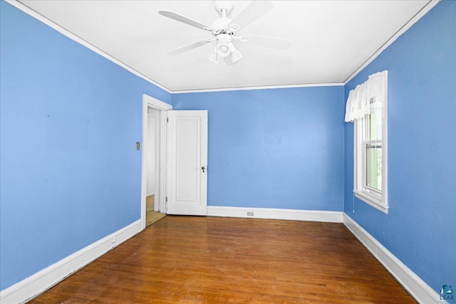 2807 E 2nd St, Duluth, MN 55812 - spare room with crown molding, wood finished floors, and ceiling fan