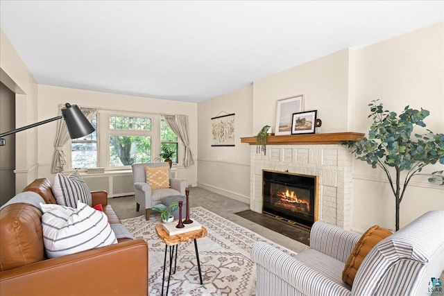 2807 E 2nd St, Duluth, MN 55812 - carpeted living area with a fireplace and radiator