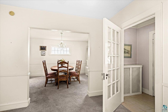 2807 E 2nd St, Duluth, MN 55812 - dining room with a chandelier, carpet floors, and french doors