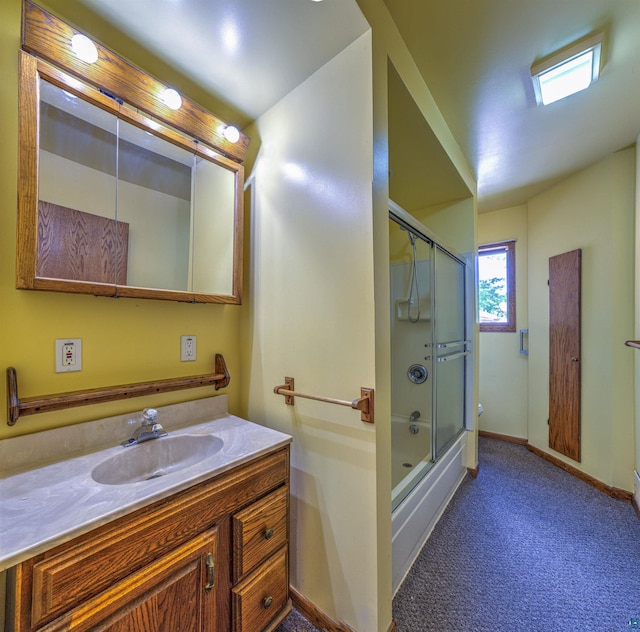 4128 Gladstone St, Duluth, MN 55804 - full bathroom with vanity and bath / shower combo with glass door
