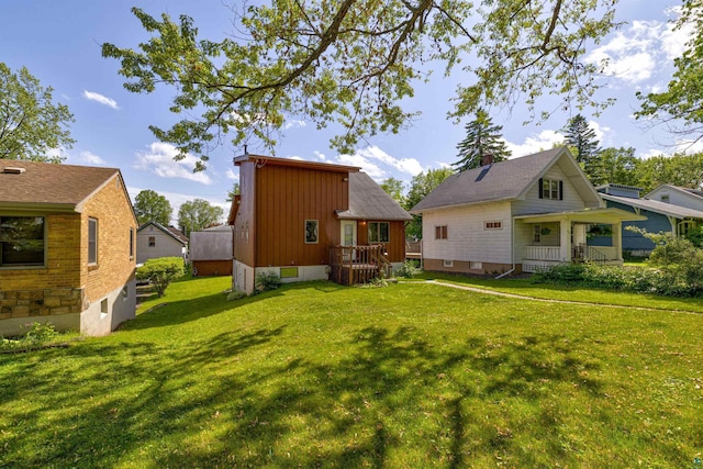 4128 Gladstone St, Duluth, MN 55804 - back of property with a yard and board and batten siding