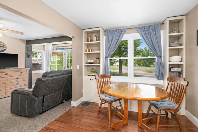 136 W Winona St, Duluth, MN 55803 - dining room featuring a ceiling fan and dark wood-style floors