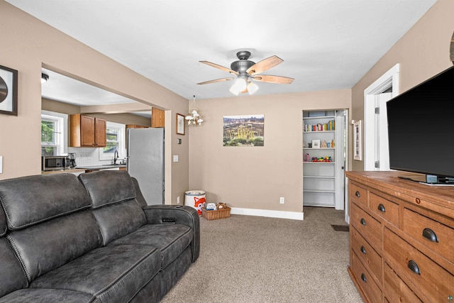 136 W Winona St, Duluth, MN 55803 - living area featuring light carpet and ceiling fan