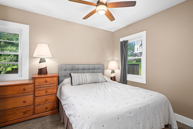 136 W Winona St, Duluth, MN 55803 - bedroom featuring dark carpet and ceiling fan