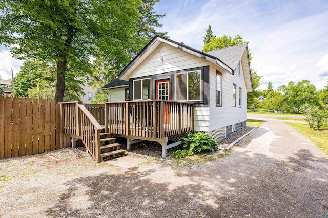 136 W Winona St, Duluth, MN 55803 - view of front facade with a wooden deck