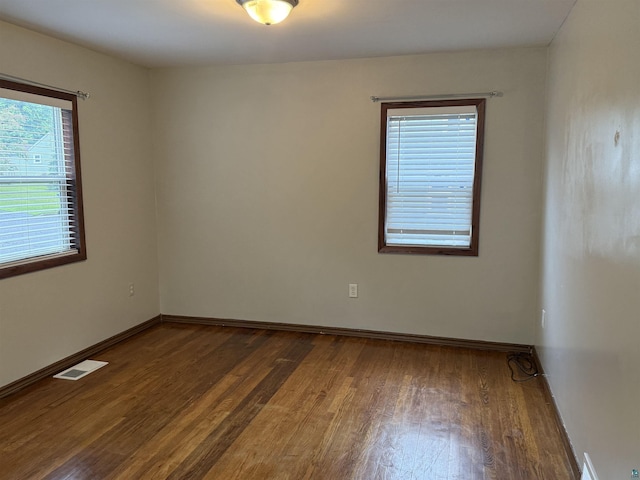 812 Allen St, Cloquet, MN 55720 - empty room featuring wood finished floors