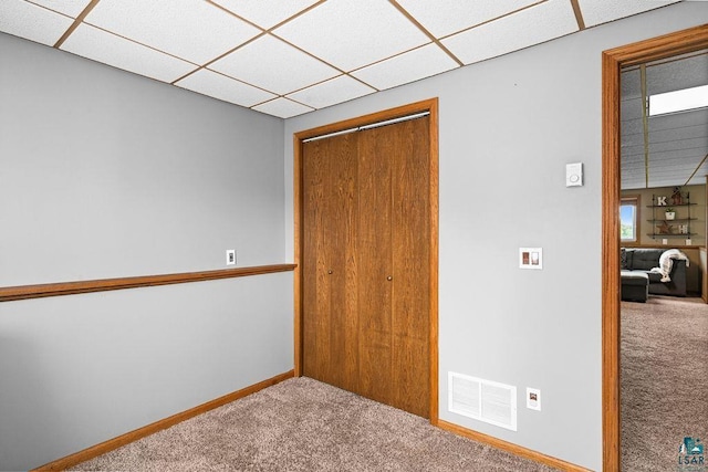 1207 Jean Marie St, Cloquet, MN 55720 - carpeted empty room featuring a paneled ceiling