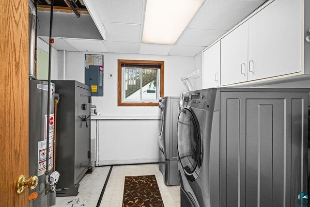 1207 Jean Marie St, Cloquet, MN 55720 - washroom with washer and clothes dryer, gas water heater, electric panel, and cabinet space