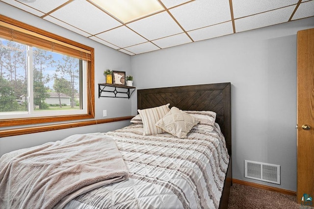 1207 Jean Marie St, Cloquet, MN 55720 - carpeted bedroom featuring baseboards and a drop ceiling