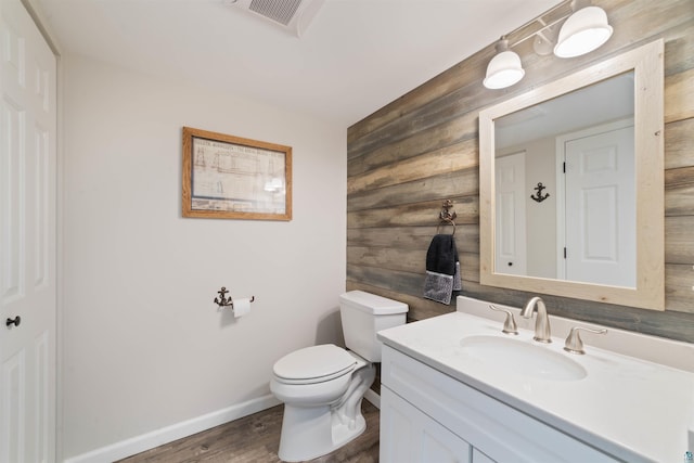 524 Marina Dr Unit 524, Superior, WI 54880 - half bath featuring wood walls, vanity, and wood finished floors