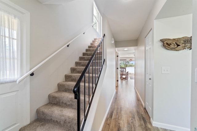 524 Marina Dr Unit 524, Superior, WI 54880 - staircase featuring wood finished floors and baseboards