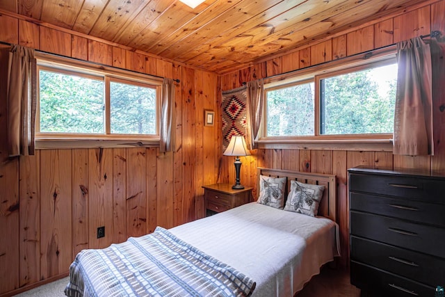 14575 Jackpine Trl, Ely, MN 55731 - bedroom with multiple windows, wood walls, and wood ceiling