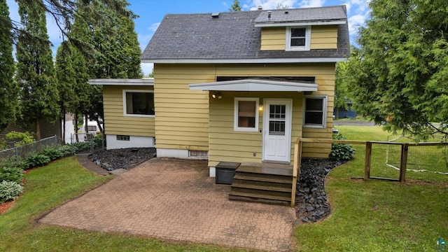 2323 Catskill St, Duluth, MN 55811 - rear view of house with a patio area and roof with shingles