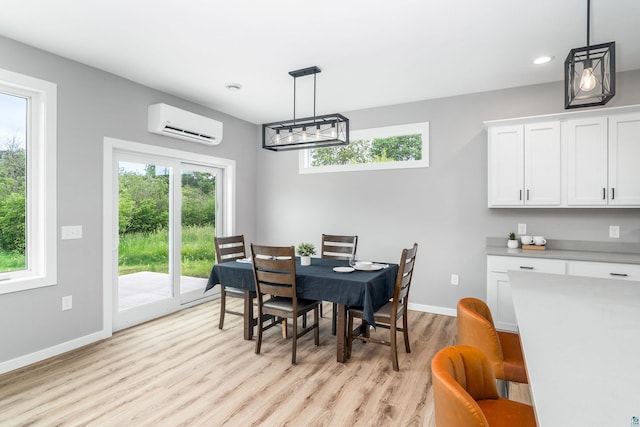 5122 Hermantown Rd Unit 5122, Hermantown, MN 55810 - dining area with a wall mounted air conditioner, light wood-type flooring, and recessed lighting