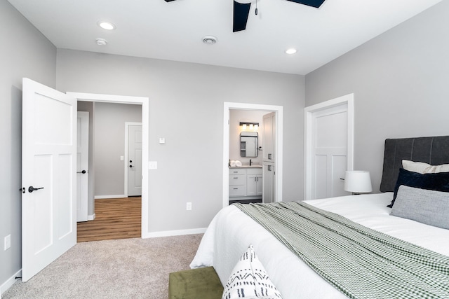 5122 Hermantown Rd Unit 5122, Hermantown, MN 55810 - carpeted bedroom with ensuite bath, ceiling fan, and recessed lighting