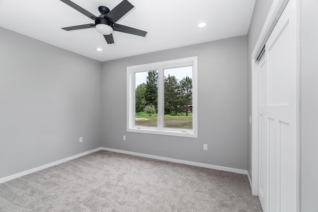 5122 Hermantown Rd Unit 5122, Hermantown, MN 55810 - unfurnished bedroom featuring light carpet, recessed lighting, a closet, and a ceiling fan