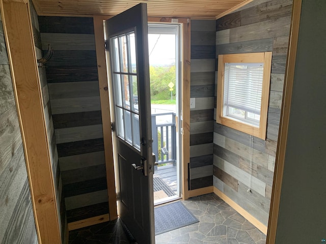 3118 Exeter St, Duluth, MN 55806 - doorway featuring wooden walls, stone finish flooring, and wood ceiling