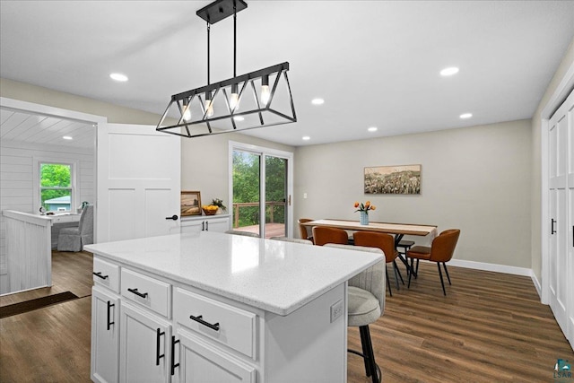 4414 Midway Rd, Hermantown, MN 55811 - kitchen featuring healthy amount of natural light, dark wood-style floors, white cabinets, decorative light fixtures, and recessed lighting