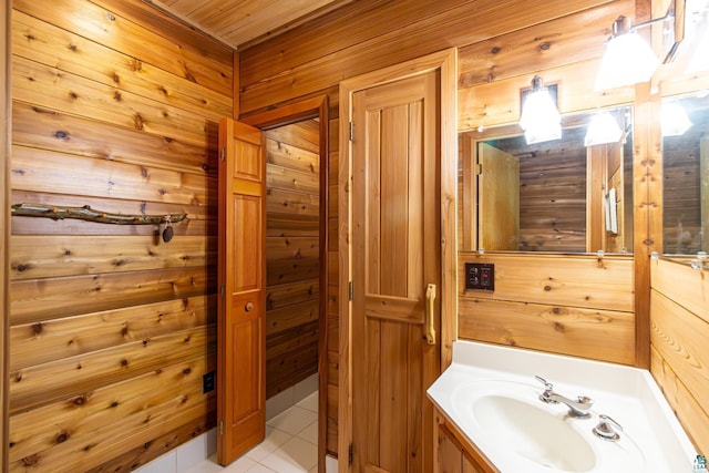 3206 Shady Rst, Ely, MN 55731 - bathroom with wood walls, vanity, tile patterned floors, and wooden ceiling
