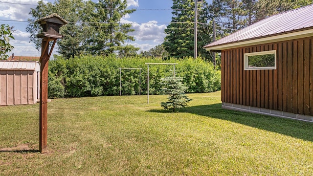 53 Dogwood Blvd, Babbitt, MN 55706 - view of grassy yard with a shed
