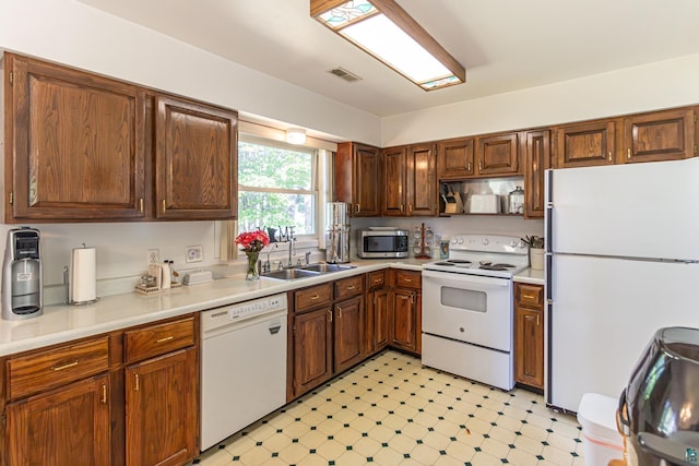 20 Ivy Blvd, Babbitt, MN 55706 - kitchen with white appliances, light countertops, light flooring, and open shelves