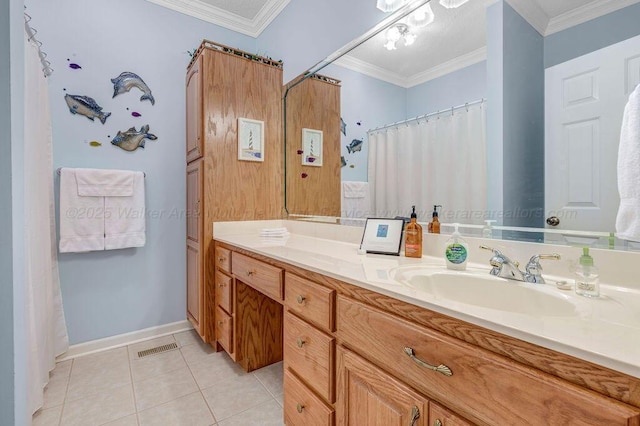 full bath featuring ornamental molding, tile patterned flooring, and vanity