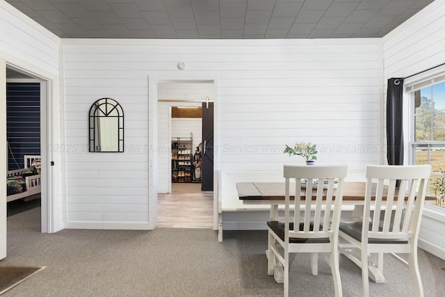 view of carpeted dining area