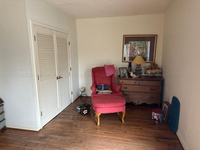 living area featuring dark hardwood / wood-style floors