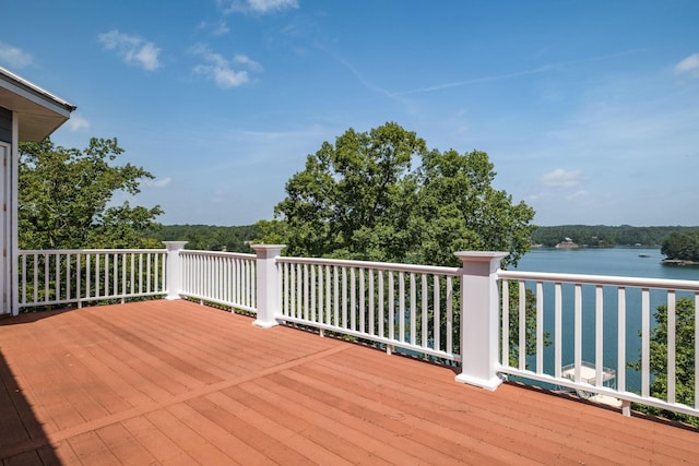 wooden deck with a water view