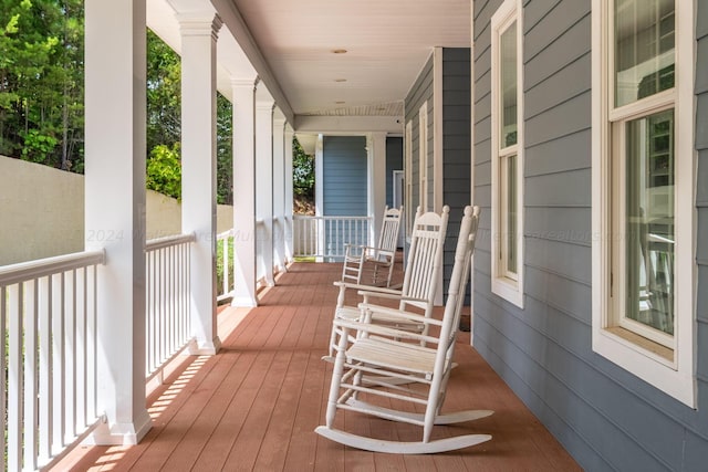 wooden deck featuring a porch