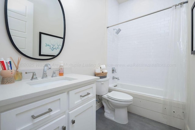 full bathroom featuring shower / bath combo, vanity, and toilet