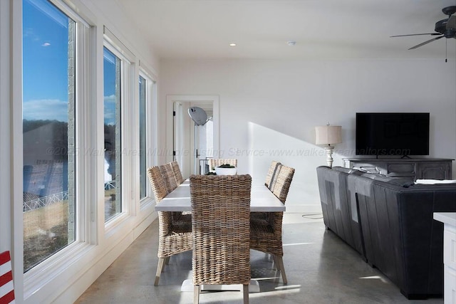 dining room featuring plenty of natural light and ceiling fan