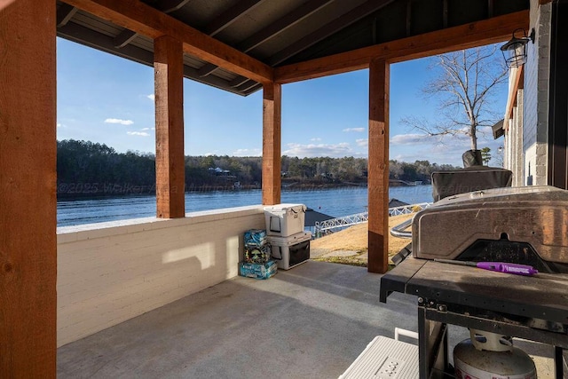 view of patio / terrace with a water view