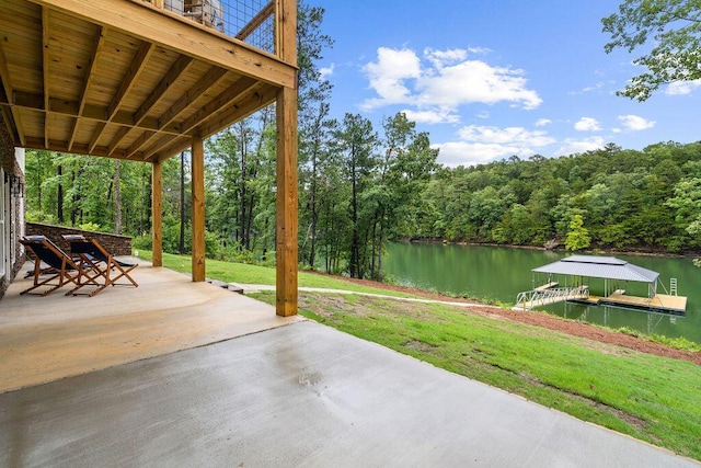 view of patio / terrace with a dock and a water view