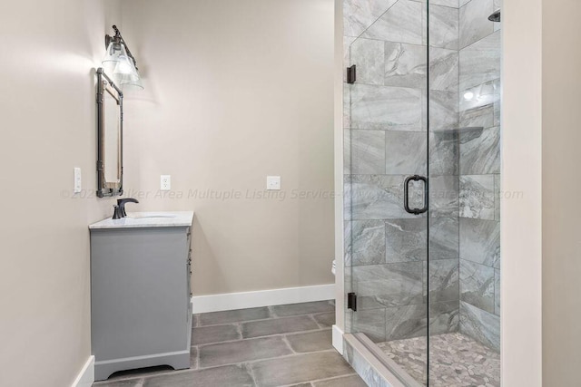 bathroom featuring vanity and walk in shower