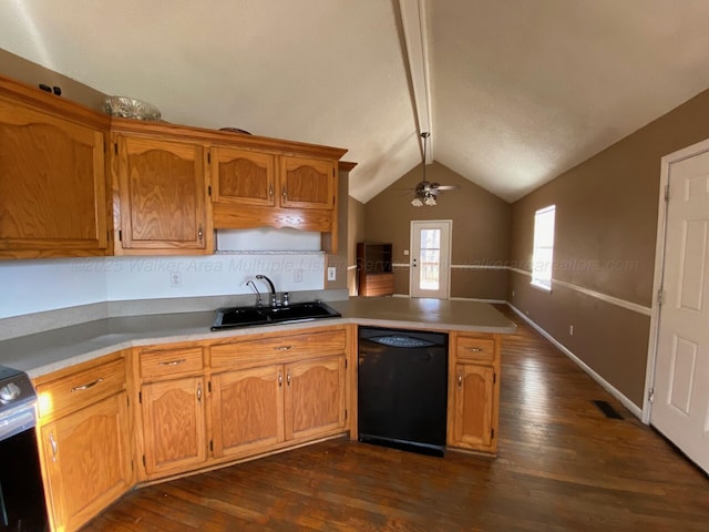 kitchen featuring a peninsula, black dishwasher, dark wood-type flooring, and a sink