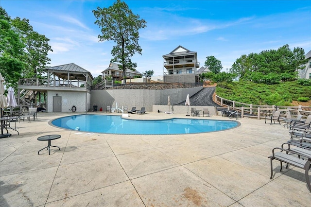 view of pool with a patio area